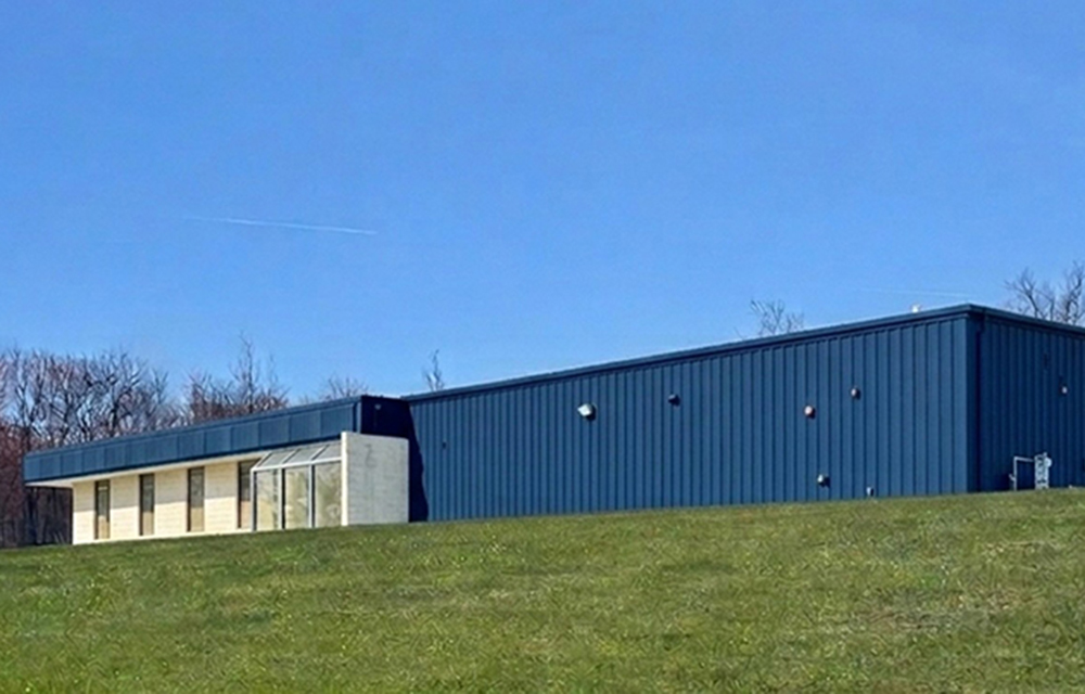 Russell and Nolan of Pearce Commercial close on 30,000 s/f industrial property in Middletown